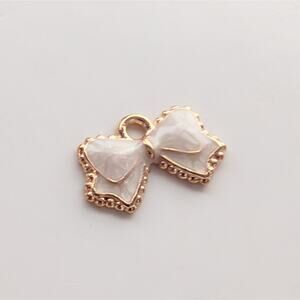Vintage Gold Tone Swirled Enamel Cottagecore Sweet Tiny Bow Bracelet Charm